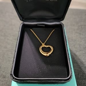 Tiffany Elsa Peretti gold necklace with diamonds